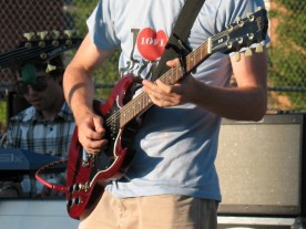 Close up of Shane Reichart playing electric guitar