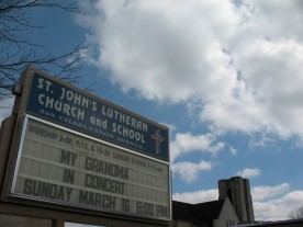 A church marquee that reads "My Grandma in Concert"